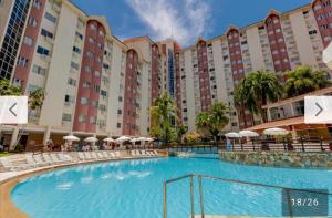 Πισίνα στο ή κοντά στο Apartamento