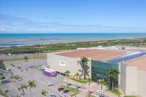 イタパリカにある2Q, Suite com TV, Shopping Boulevard, Vista para Mar, Ed Palmer, NOMDSの海の空の景色