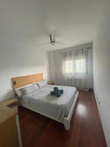 Postel nebo postele na pokoji v ubytování Apartamento Fórum - Ciencias + 17 fotografií