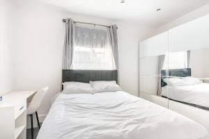 Ένα ή περισσότερα κρεβάτια σε δωμάτιο στο Burley Guest House