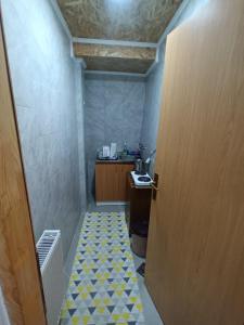 Kuchyň nebo kuchyňský kout v ubytování LUNA 2 dvoetažni apartman