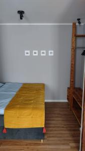 Ένα ή περισσότερα κρεβάτια σε δωμάτιο στο Studio-Apartment in Eisenberg, Thüringen