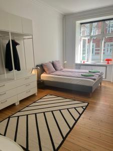 Voodi või voodid majutusasutuse Topcity toas