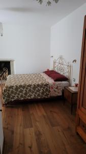 Giường trong phòng chung tại Casa vacanze Madonna degli angeli