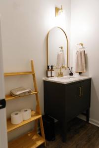 a bathroom with a sink and a mirror at "Morning View 3" Cozy Modern Stay - College/Hiking in Berea +16 photos