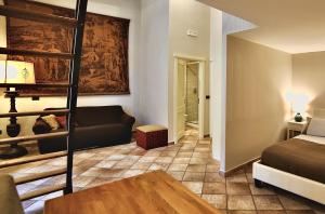 En eller flere senge i et værelse på B&B Palazzo Solimena