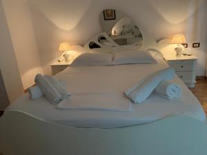 Giường trong phòng chung tại Fabio's Apartament