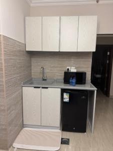 Kuchyň nebo kuchyňský kout v ubytování Living House, North Rakah, Al Khobar + 7 fotografií