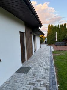 a driveway leading to a house at Podwika Resort Zagórzany in Gorlice