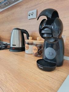 Kaffe- og tefaciliteter på Boutique apartment yellow 1