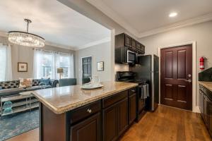 a kitchen with a large counter top in a room at Stylish 1br Getaway In Historic Dallas in Dallas +13 photos