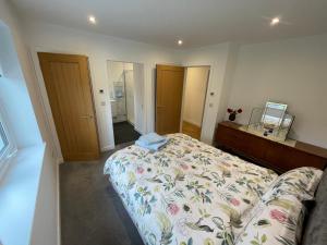 Postel nebo postele na pokoji v ubytování Fionnlagh Cottage