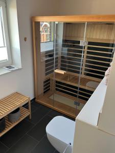 Koupelna v ubytování Penthouse-Wohnung "Hygge" mit großer Sonnenterrasse, eigener Sauna & kostenlosem Strandkorb + 54 fotografií