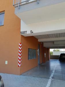 a building with a sign on the side of it at Apartment brand new in Seredʼ