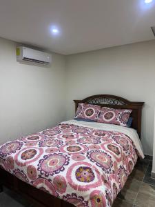 Ένα ή περισσότερα κρεβάτια σε δωμάτιο στο Departamento relax