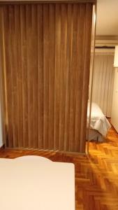 Una cama o camas en una habitación de Obelisco cityy