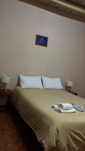 Postel nebo postele na pokoji v ubytování El Amanecer