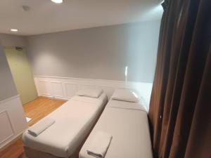 Katil atau katil-katil dalam bilik di Hotel De Angsana +3 gambar