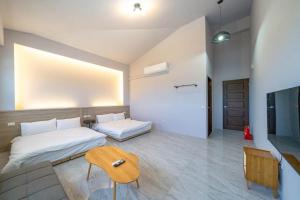 Fotografie z fotogalerie ubytování OsYan Homestay v destinaci Ťiao-si