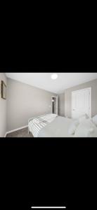 En eller flere senge i et værelse på The Evans Retreat