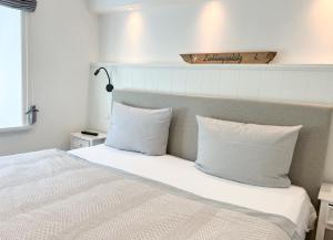 En eller flere senge i et værelse på Meersalz