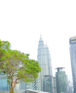 a view of a city skyline with tall buildings at The Mews KLCC By Service Apartment in Kuala Lumpur