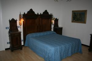 Postel nebo postele na pokoji v ubytování Albergo Cavallino