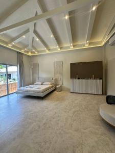 Ένα ή περισσότερα κρεβάτια σε δωμάτιο στο Beachside Residence +190 φωτογραφίες