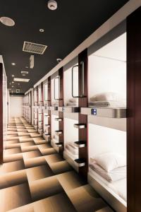Postel nebo postele na pokoji v ubytování Hotel M Matsumoto