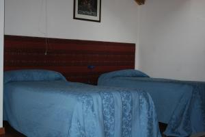 Postel nebo postele na pokoji v ubytování Albergo Cavallino