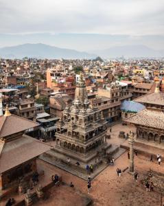 an aerial view of a city with a building at Balcony apartment- 50m from Patan Durbar Sq in Pātan