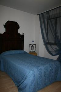 Postel nebo postele na pokoji v ubytování Albergo Cavallino