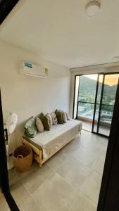 Una cama o camas en una habitación de Samaia Loft