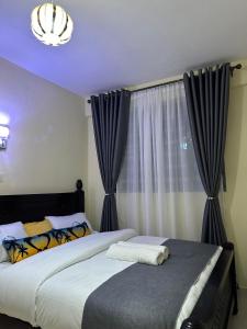 Postel nebo postele na pokoji v ubytování Gee homes kamakis + 23 fotografií