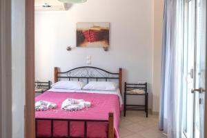 Ένα ή περισσότερα κρεβάτια σε δωμάτιο στο Villa Tapia