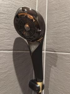 a hair dryer is hanging on a wall at 玄Gen Private Villa in Takayama