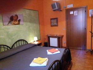 a room with a table with two napkins on it at Soggiorno Petrarca in Florence