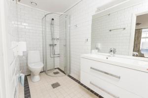 Ванная комната в Hotell Vic Porsgrunn