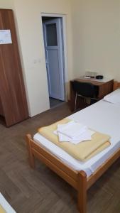 Postel nebo postele na pokoji v ubytování Hostel Kristal