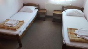 Postel nebo postele na pokoji v ubytování Hostel Kristal