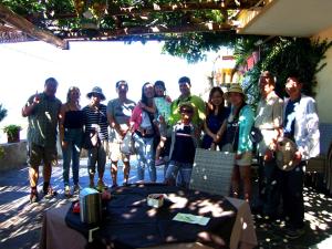a group of people standing next to a table at Locanda Degli Agrumi in Conca dei Marini