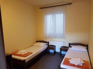 Postel nebo postele na pokoji v ubytování Hostel Kristal