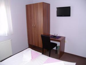 TV a/nebo společenská místnost v ubytování Hostel Kristal