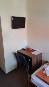 TV a/nebo společenská místnost v ubytování Hostel Kristal