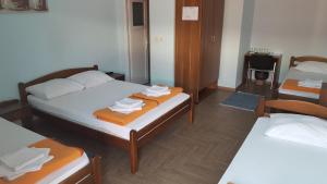 Postel nebo postele na pokoji v ubytování Hostel Kristal