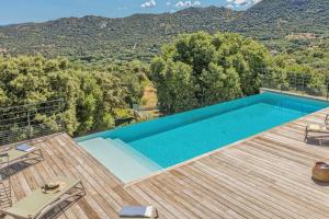 a swimming pool on the deck of a villa at Villa Monticello in Monticello