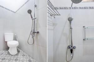 a bathroom with a shower and a toilet at SPOT ON Podomoro Homestay in Yogyakarta +23 photos