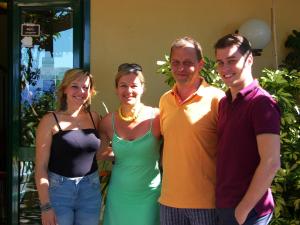 a group of people posing for a picture at Locanda Degli Agrumi in Conca dei Marini