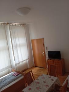 Μια τηλεόραση ή/και κέντρο ψυχαγωγίας στο Ferienwohnungen Altstadt