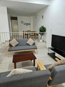 Μια τηλεόραση ή/και κέντρο ψυχαγωγίας στο Leisure Homestay